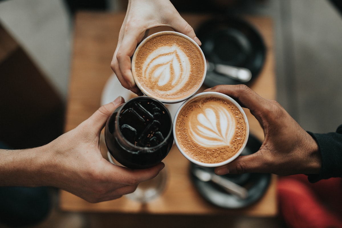 Woman enjoying morning coffee — taking control of health with Aayu Well